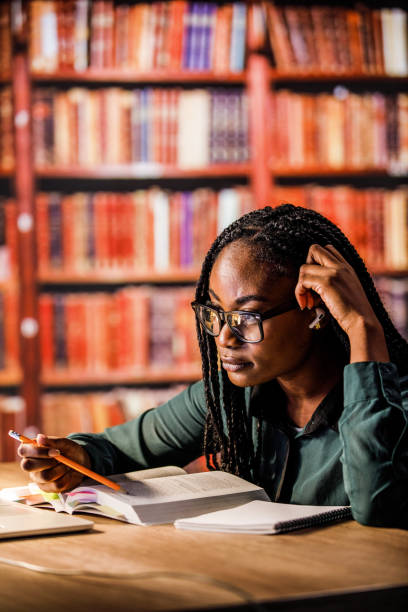 istock Annoyed female university student overwhelmed by amount she has to study 1693026883