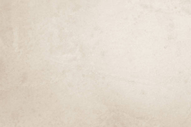 istock Colour old concrete wall texture background. Close Up retro plain cream color cement wall background texture. Design paper vintage parchment element show or advertise or promote product on display. 1693029336