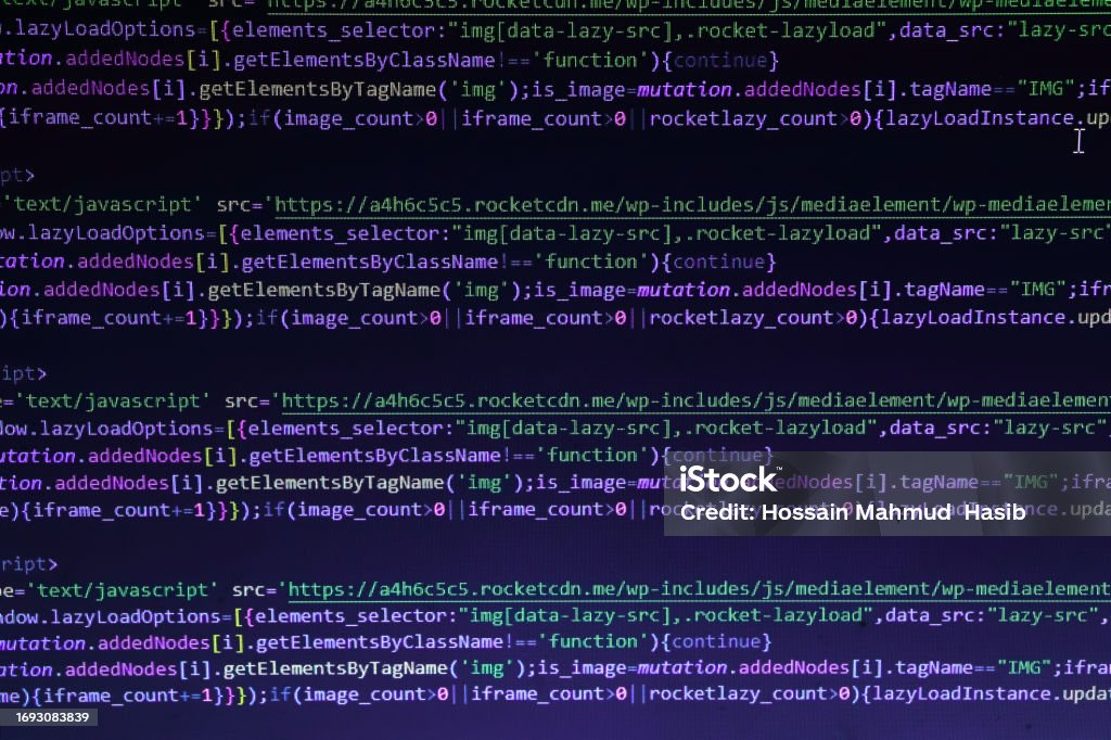 Css and php code on dark blue background in the code editor, close up. Splitting of php and css code, front view Applying Stock Photo