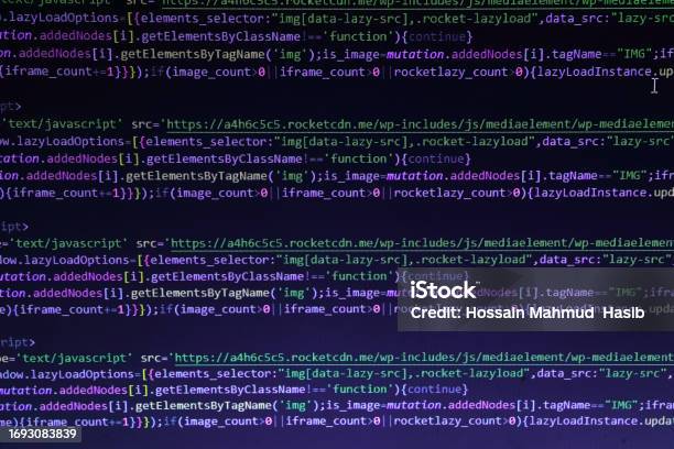 Css And Php Code On Dark Blue Background In The Code Editor Close Up Splitting Of Php And Css Code Front View Stock Photo - Download Image Now
