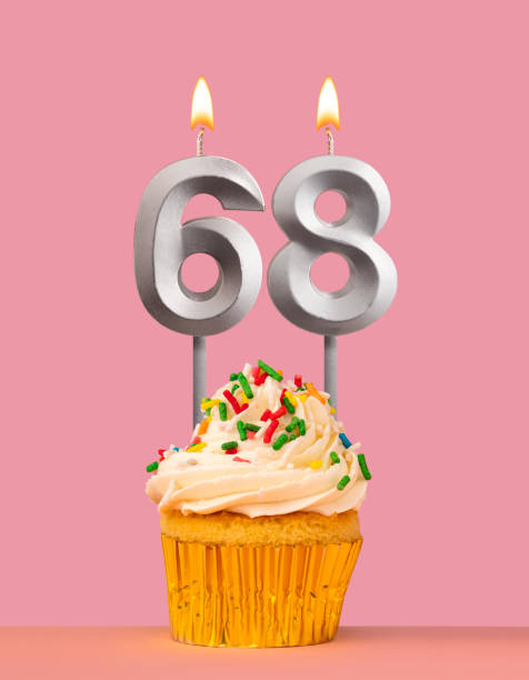 istock Birthday card with cupcake and candle number 68 1693087565