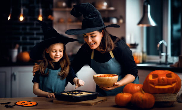istock family preparing for Halloween 1693151176