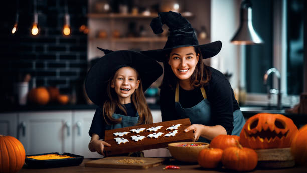 istock family preparing for Halloween 1693151181