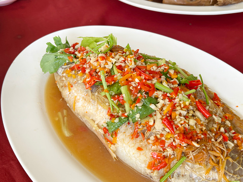 fish with spicy sauce and vegetables