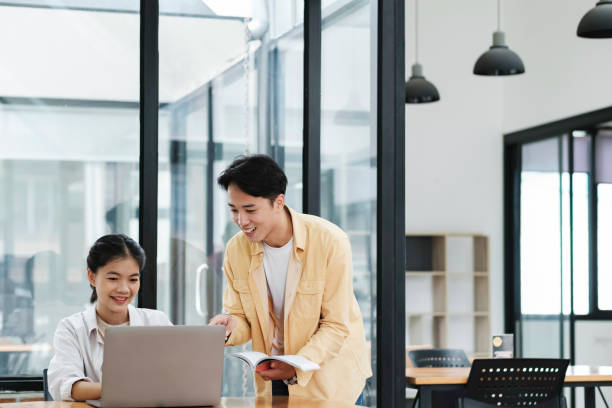 istock Young students campus helps friend catching up and learning. 1693194609