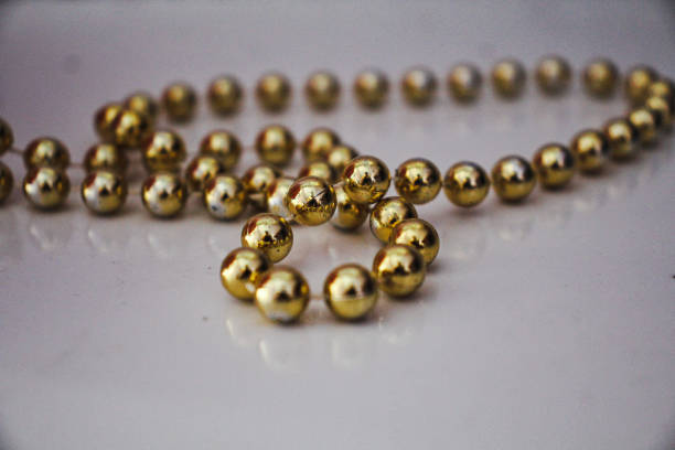 Chain necklaces in gold tone.