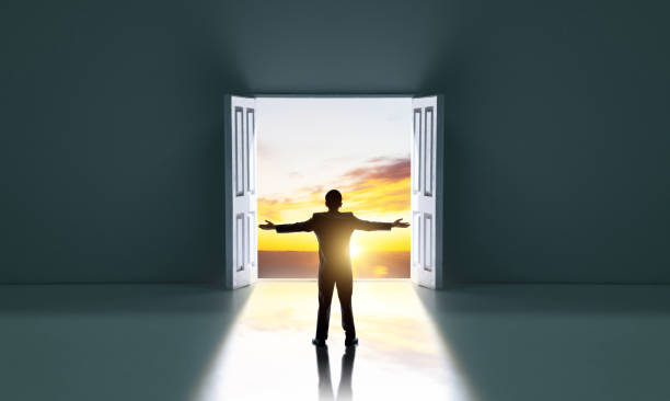 istock Businessman standing in front of open door 1693202337