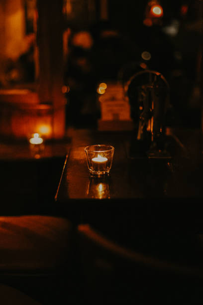 istock Candle in the glass on the table 1693212405