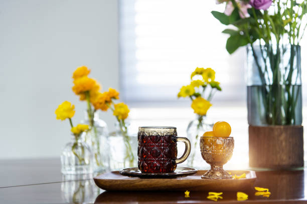 Coffee and bouquet on the table