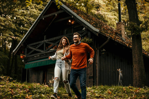 istock Joyful couple running in the nature 1693217436