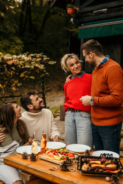 istock Friends toasting at the picnic 1693217964