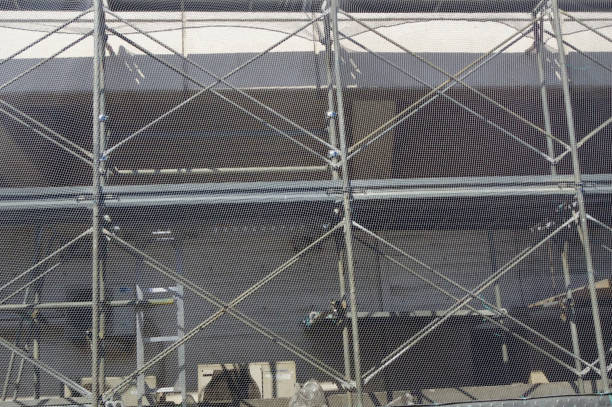 istock construction site with scaffolding and metal pipes 1693258985
