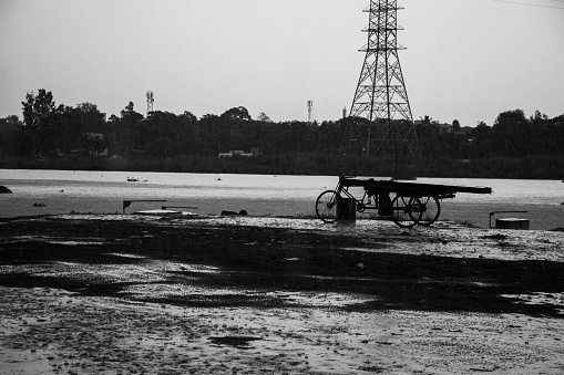 Black and white rainy day boat station photography from Ruhitpur, Bangladesh, on September 05, 2022