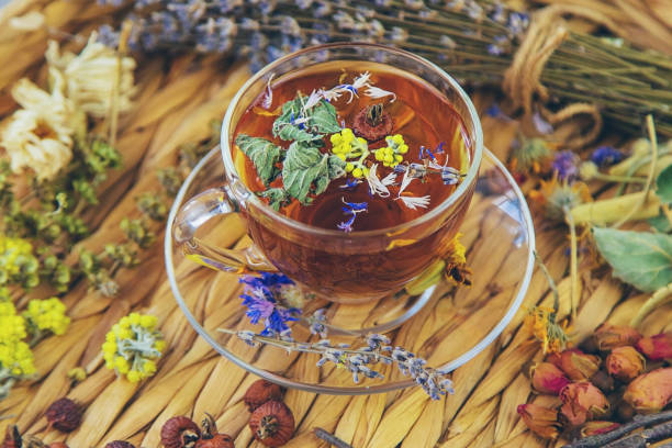 istock Herbal tea with medicinal herbs and flowers. Selective focus. 1693307905