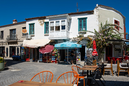 Istanbul, Turkey - September 15, 2023:Alacati, a touristic place famous for its historical stone houses and beaches suitable for windsurfing. General and touristic views from the center of Alaçatı.