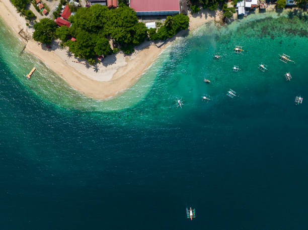 istock Tropical Island with white beach in Samal Island. 1693310173