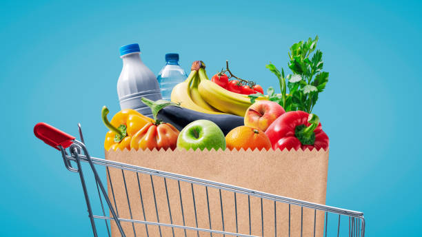 istock Shopping cart with fresh groceries 1693319902
