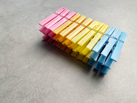 Colorful clothespins with copy space