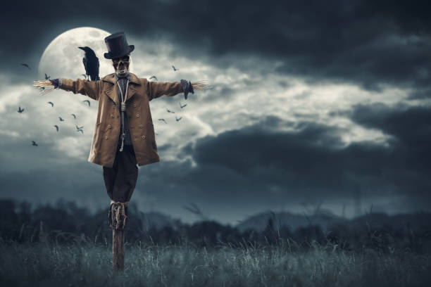 istock Creepy scarecrow and full moon 1693336328