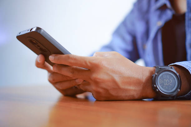 istock Man Touching Smartphone Screen, Sending Messages or Online Shopping Concepts 1693341404