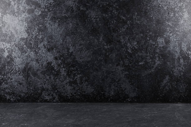 istock Black abstract textured background with stains and scratches. Wall and floor grunge style 1693369032