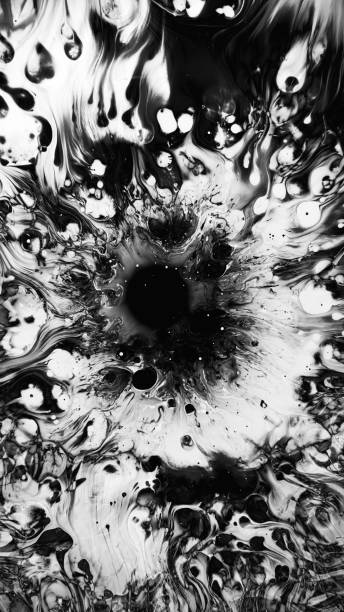 istock Black ink wet swirls dark white fluid splatter 1693375325