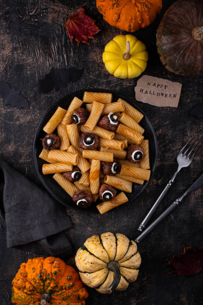 istock Halloween pasta with meatballs monster eye 1693379655