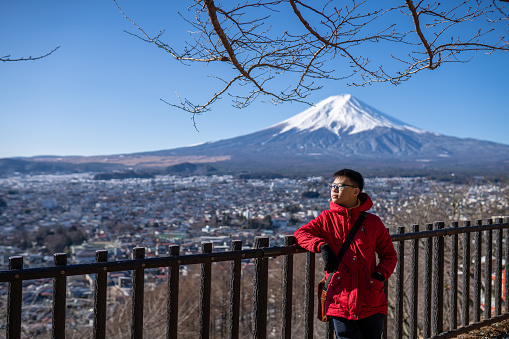Asian Teenager boy admiring Mt Fuji