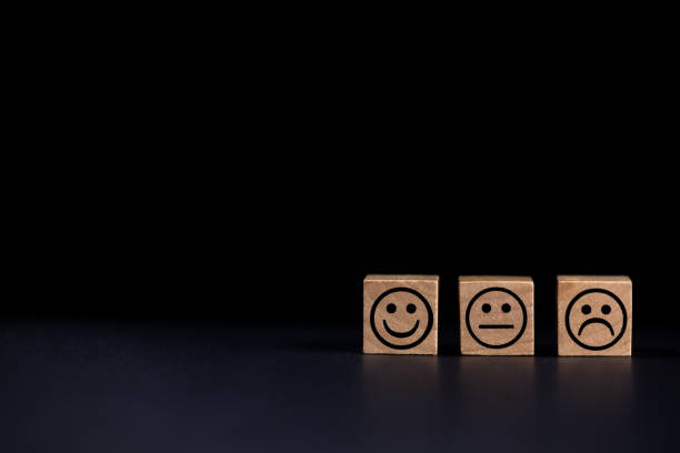 istock smiling, sad and normal face icons on black background 1693410952