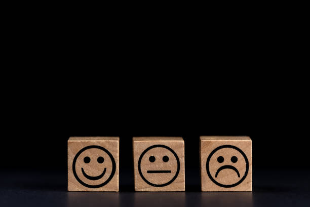 istock smiling, sad and normal face icons on black background 1693410957