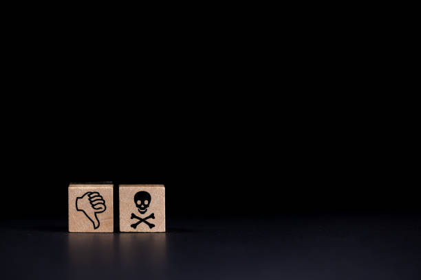istock thumbs down icon next to death icon on black background 1693411115