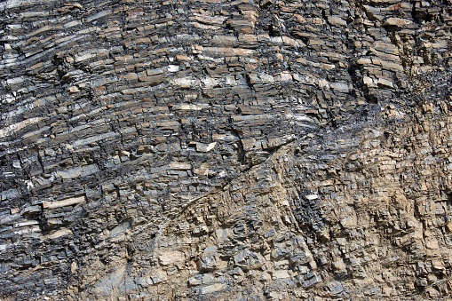 Flysch is a sequence of sedimentary rock layers that progress from deep-water and turbidity flow deposits to shallow-water shales and sandstones (Mersin, Türkiye).