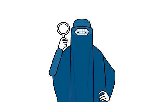 Muslim woman in burqa looking through magnifying glasses