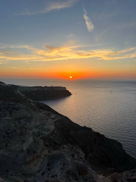 istock Santorini coastline at sunset, Greece 1693430091