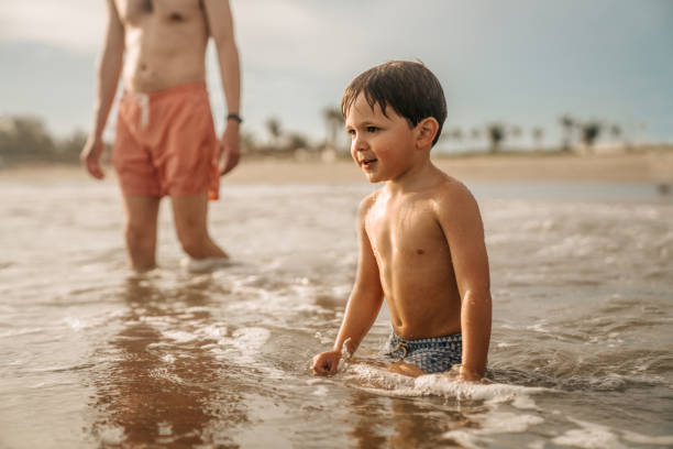 istock Family enjoying the beach 1693439268