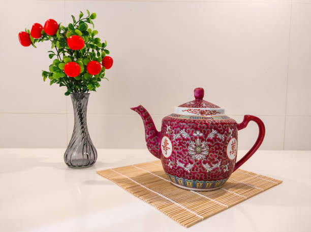 Chinese Mun Shou porcelain Lidded Tea mug Jingdezhen red, isolated on white background