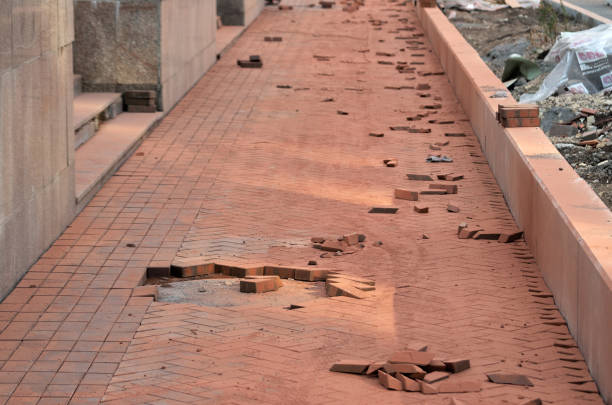istock Laying paving slabs on a sidewalk being repaired 1693458188