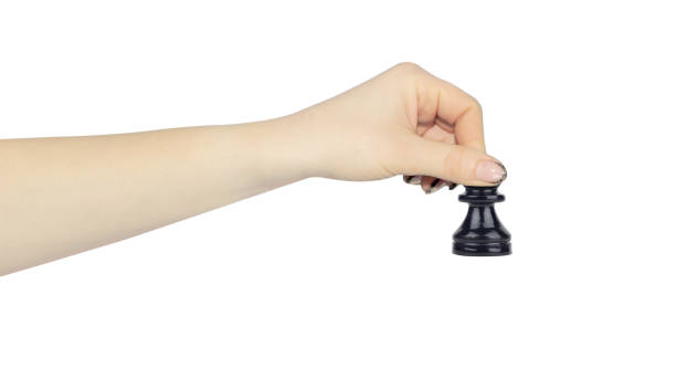istock chess pawn in outstretched hand isolated from background, chess game concept, pawn move 1693507882