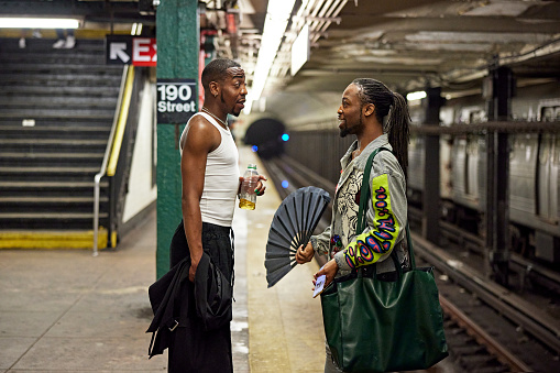 Candid conversation between New Yorkers waiting for train