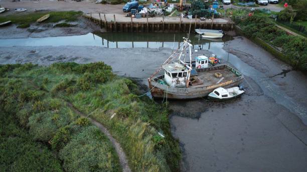 istock Fishing boat at Brancaster Staithe 1693511714