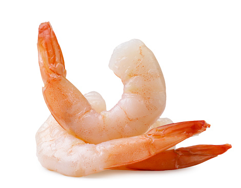 Peeled cooked shrimp close-up on a white background. Isolated