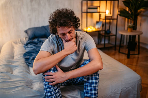 istock Young Man Having Insomnia In His Bedroom At Night 1693542893