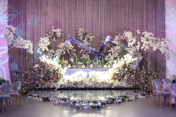 istock a table is sitting with flowers and greenery on it 1693574755