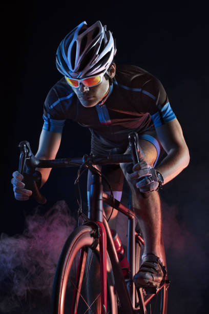 istock Sport. Athlete cyclists in silhouettes on white background 1693595488