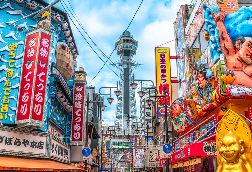 Tsutenkaku tower in Osaka's Shinsekai entertainment district on a sunny day. Osaka, Japan