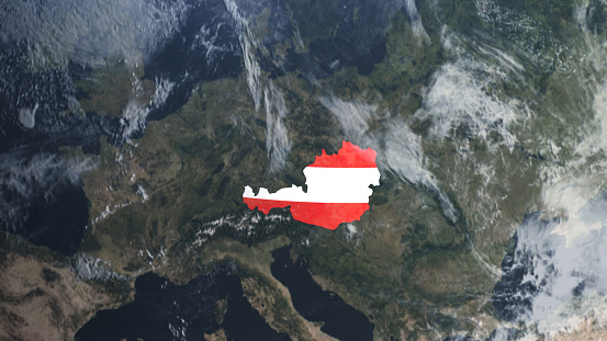 Credit: https://www.nasa.gov/topics/earth/images\n\nAn illustrative stock image showcasing the distinctive tricolor flag of Austria beautifully draped across a detailed map of the country, symbolizing the rich history and cultural pride of this renowned European nation.