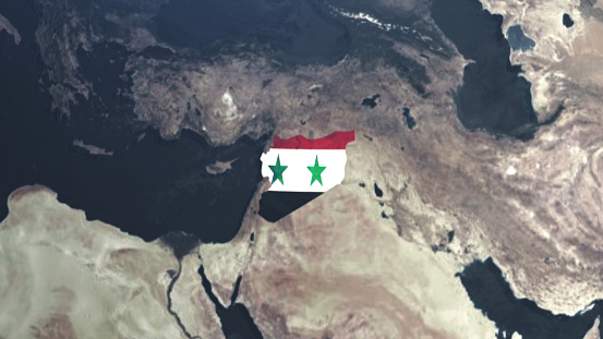Credit: https://www.nasa.gov/topics/earth/images\n\nAn illustrative stock image showcasing the distinctive tricolor flag of Syria beautifully draped across a detailed map of the country, symbolizing the rich history and cultural
