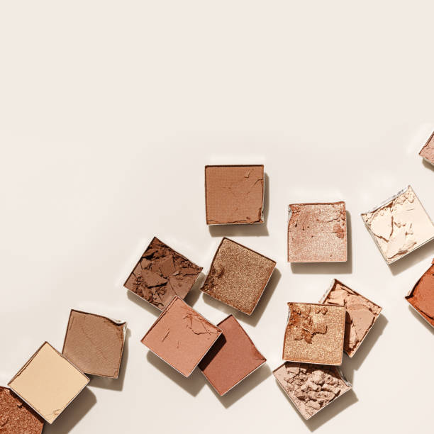 istock Beauty product neutral colored eyeshadows for makeup, beige monochrome pattern with copy space, minimal flat lay with nude colors swatches eyeshade, cosmetic texture, beige color palette 1693638153