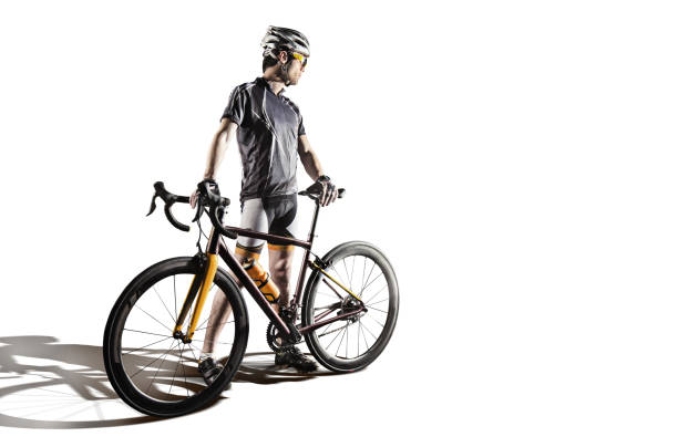 istock Athlete cyclists in silhouettes on neutral background. 1693647768