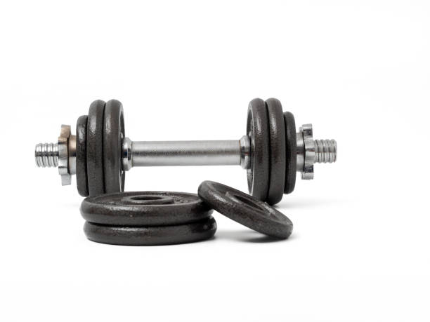 istock Sports equipment dumbbell on a white background. 1693658360